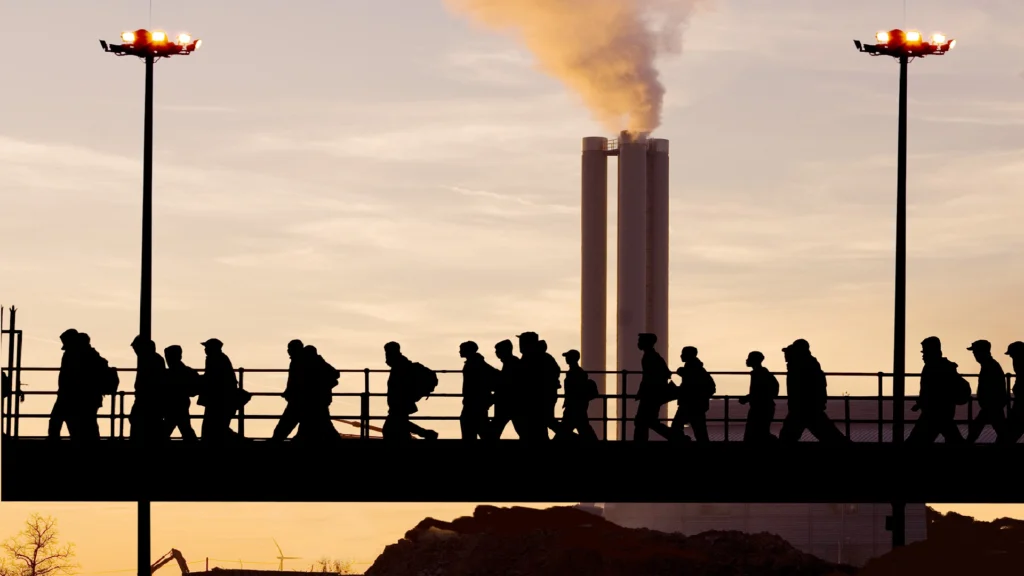 Corporate restructuring concept showing workforce reduction