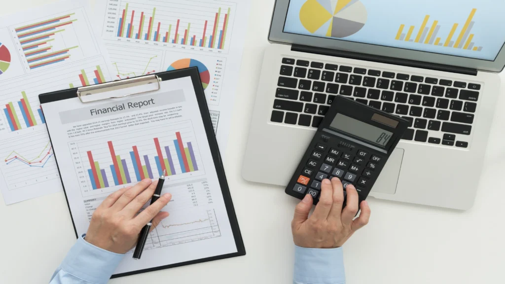 Person analyzing monthly income and expenses to understand financial situation