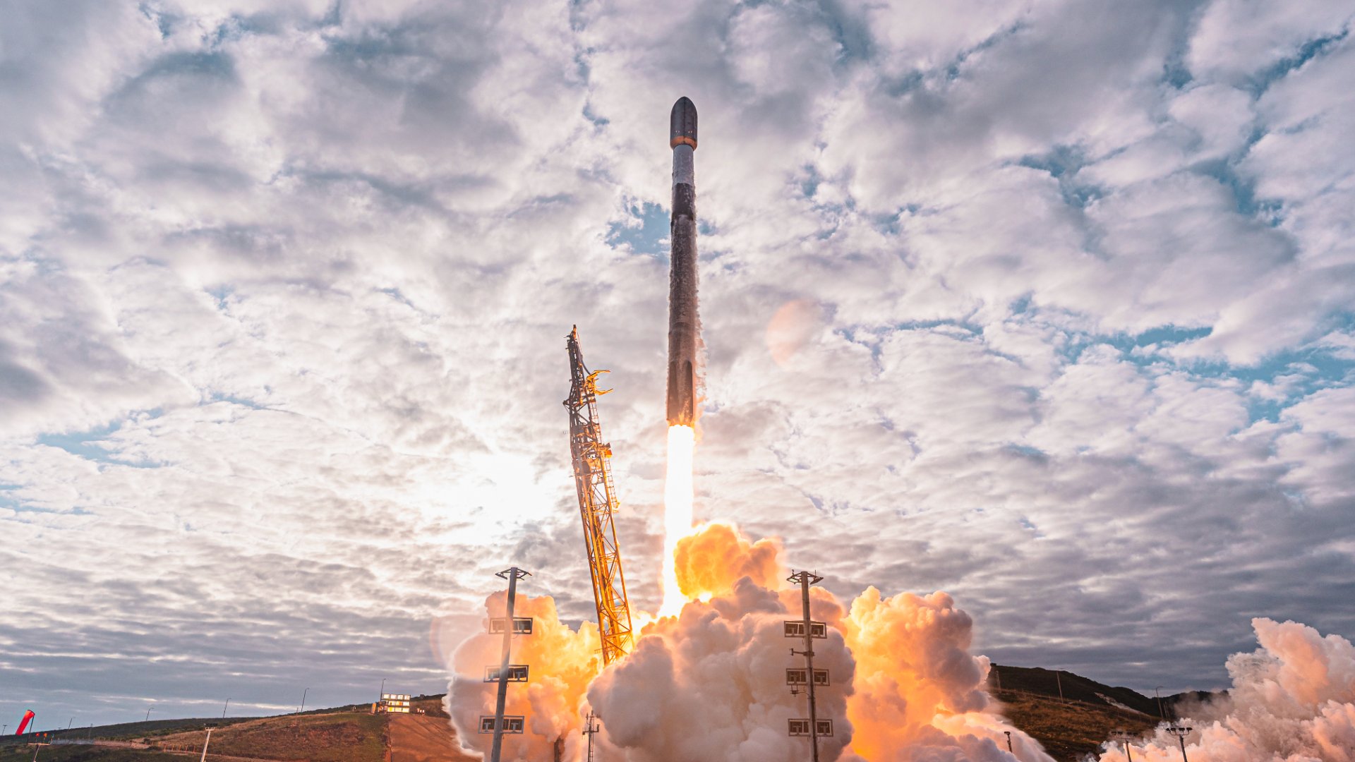 SpaceX Falcon 9 rocket launching Foxconn satellites into low-Earth orbit