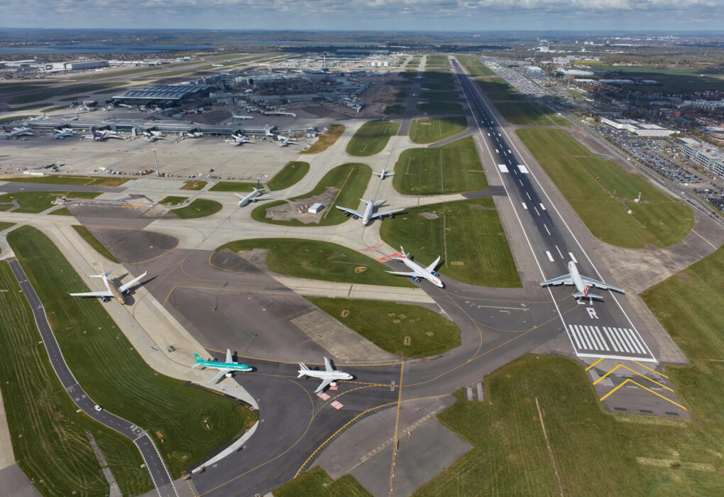 An aircraft lining up on the runway at Heathrow airport