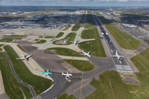 An aircraft lining up on the runway at Heathrow airport